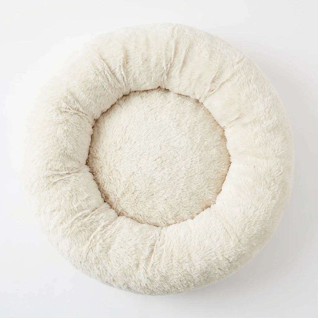 Overhead bird eye view showing the circular shape of the donut dog bed