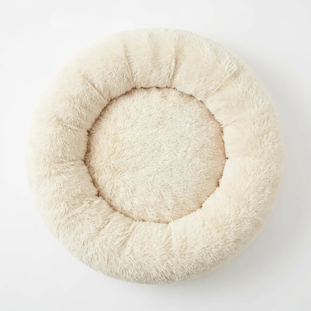 Overhead view of round donut dog bed