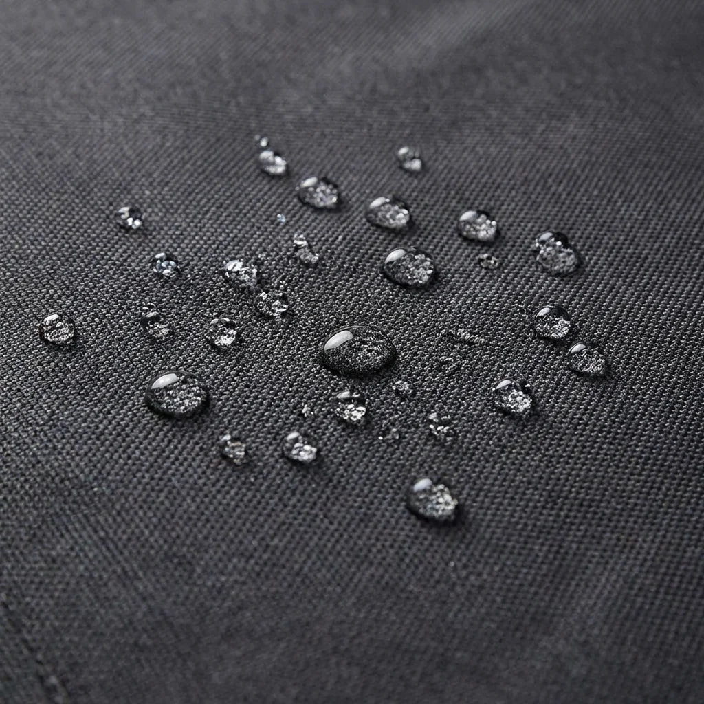 Water droplets beading on waterproof fabric of car seat cover