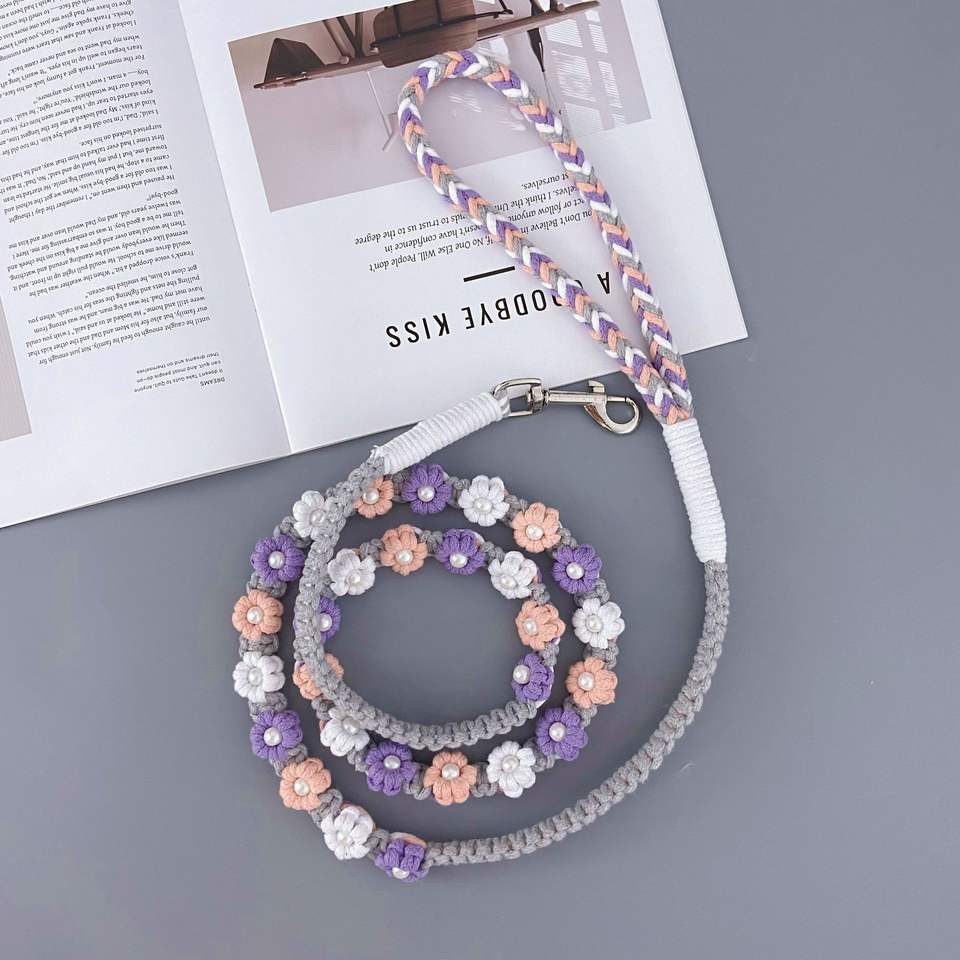 Braided dog leash showing full length and floral handle shape