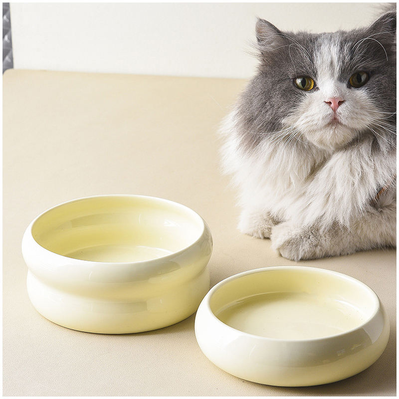 Ceramic double pet bowl with wooden stand front view
