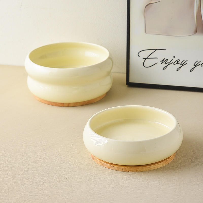 Ceramic double bowl set showing stand and bowl depth