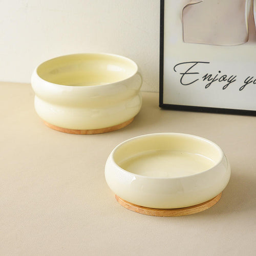 Ceramic double bowl set showing stand and bowl depth